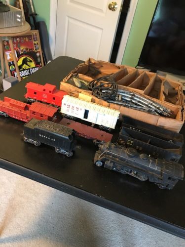 Vintage Marx USA Train Set, Train Cars, Metal Tracks And Toy Transformer