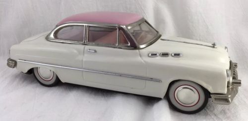 Vintage 1950's Buick Large Pink and White Friction Standard Sedan Car Tin Toy