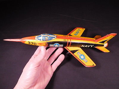 RARE vintage yellow colored NOMURA JAPAN tin toy friction U.S. NAVY Jet Fighter