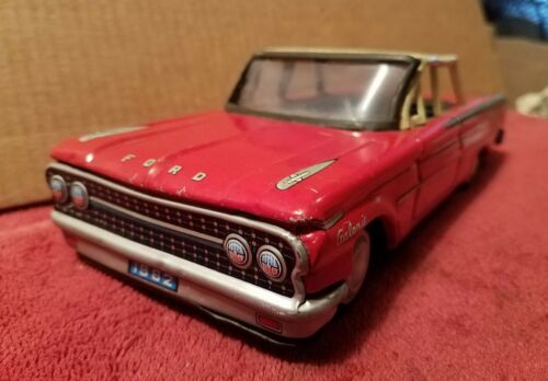 VINTAGE JAPANESE TIN TOY CAR- 1962 FORD- FRICTION MOTOR- LITHO-RED-SCARCE- DAITO
