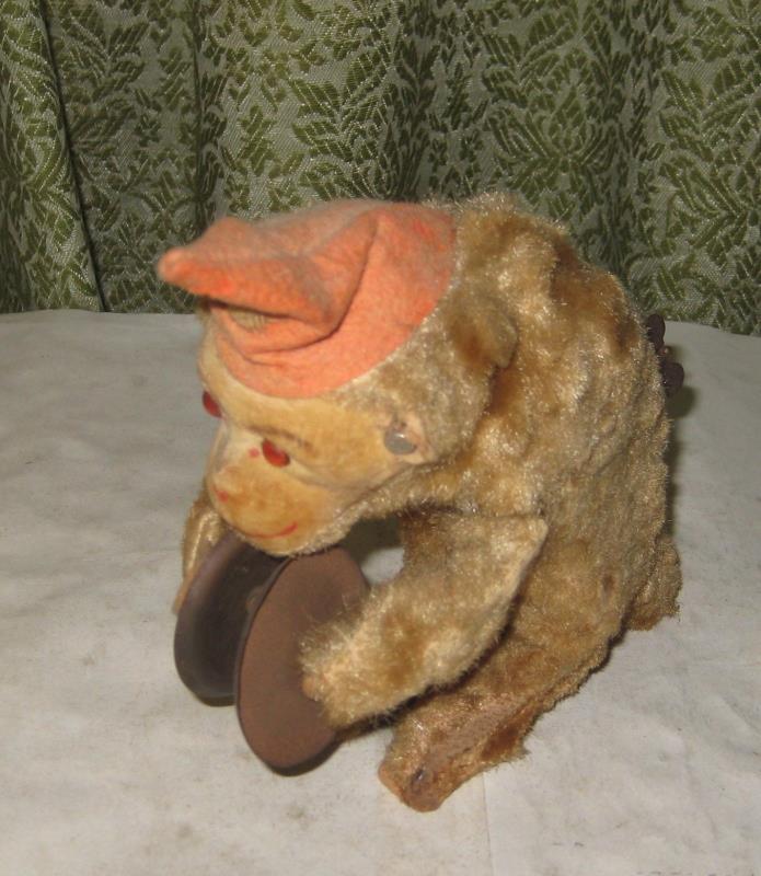298F-1 VINTAGE TOY MONKEY WITH CYMBALS, 7 INCH TALL, SOME MOVEMENT WHEN PICTURES
