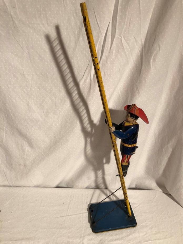 Marx Smokey Joe Climbing Fireman Tin Windup Toy Works Well