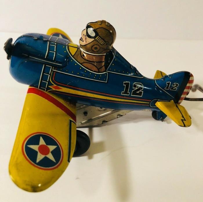 Excellent 1940's Marx Blue Tin Roll Over #12 Airplane with Pilot Windup