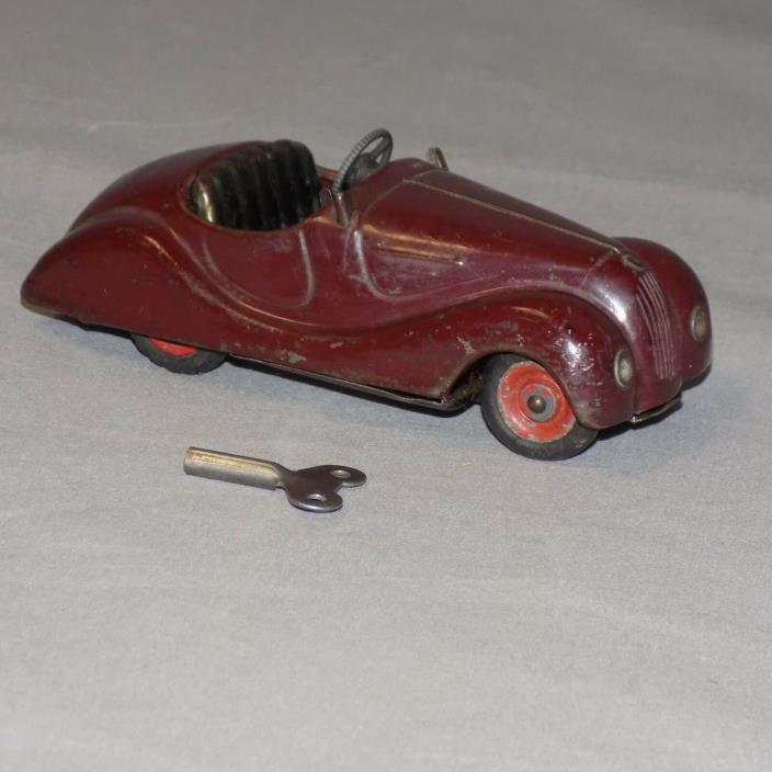 Schuco Burgundy Akustico 2002 in Wind Up car and horn Made in Germany working