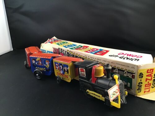 Vintage Tin Litho Zig Zag Comic Express Wind Up TrainWorking with Key Toy Used