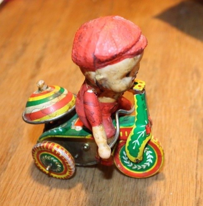 Antique Metal Boy on Trike toy