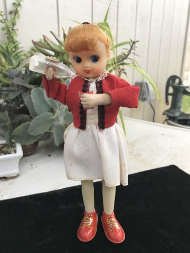 VINTAGE wind up mechanical toy GIRL DRINKING MILK Made in Japan