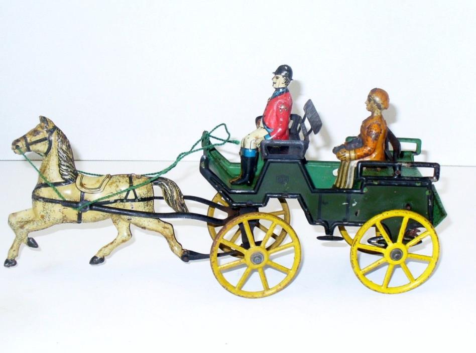 RARE GERMAN TIN LITHO WIND-UP HORSE-DRAWN WAGON WITH DRIVER & WOMAN PASSENGER