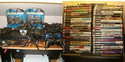 PS2 LOT 2 SLIM CONSOLES,4 CONTROLLERS,2 PWER AC ADAPTERS,2 AV CABLES,40 GAMES ++