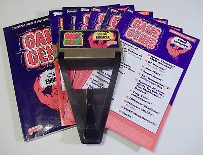 Game Genie (Nintendo) NES Game Genie w/ vol. 3 Code Book and 6 update codebooks