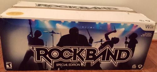 Wii Rock Band Special Edition- Partly Used- 2 Games- Drums- Guitar- Microphone