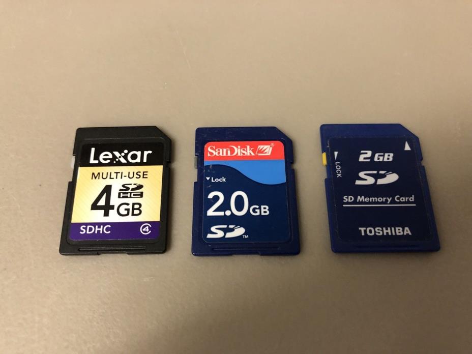 3x SD Memory Card Lot - 4GB Lexar, 2GB ScanDisk, 2GB Toshiba