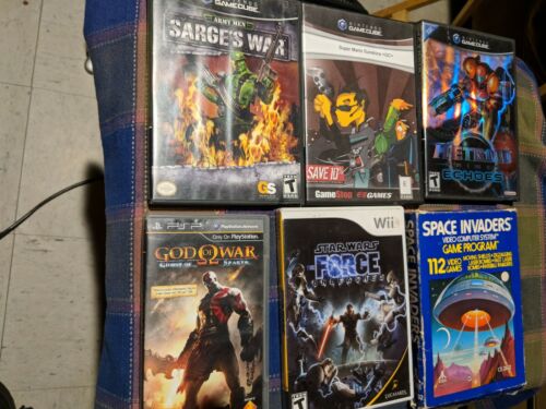 Assortment of Used Game CASES. Some with manual.