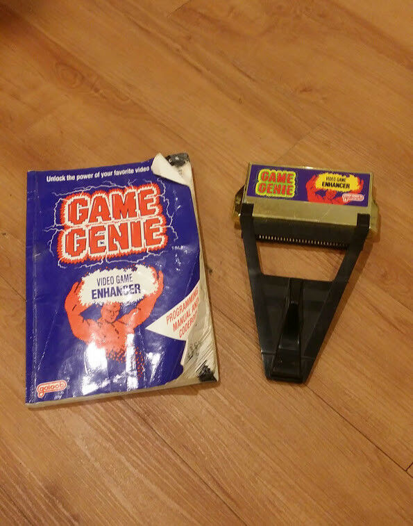 Game Genie Nintendo NES - Video Game Enhancement Cartridge and Manual