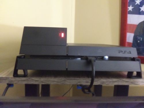 Playstation 4 500GB With Nyko data bank and 3D printed feet.