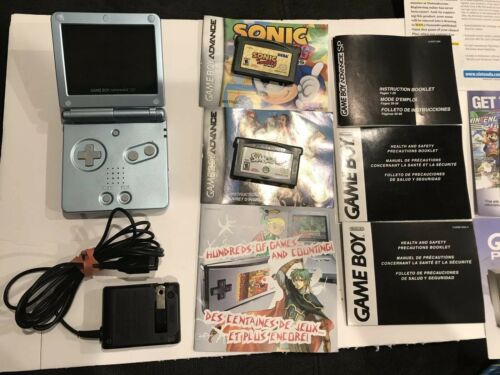Nintendo Game Boy Advance SP AGS-101 Pearl Blue with 2 Games and Manuals.