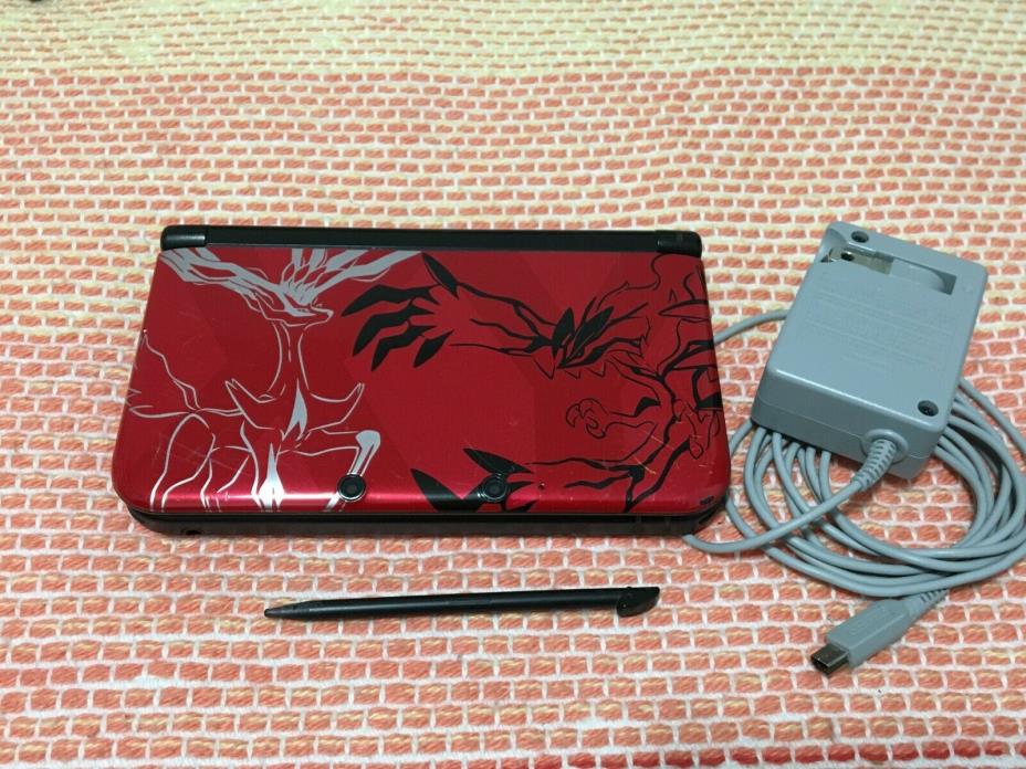 Nintendo 3DS XL Pokemon X and Y Red Handheld System. Red Color