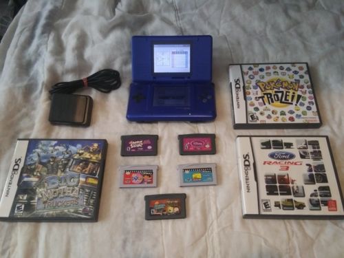 Nintendo DS Launch Edition Electric Blue Handheld System bundle works great