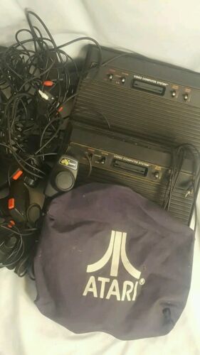 Lot of Atari Consoles Paddles Joysticks Dust Cover Adapter Untested