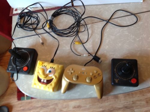 LOT OF 4 GAME CONTROLERS