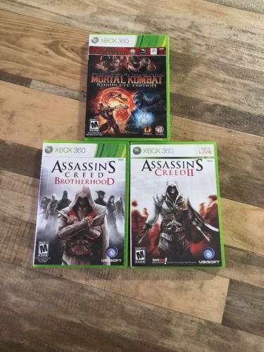 Lot Of 3 Used Xbox 360 Games Assassin's Creed II, Brotherhood, Mortal Kombat