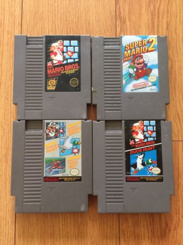 Lot of 4 NES Games/Super Mario Bros 1/Mario Bros 2 /Duck Hunt/Track and Field