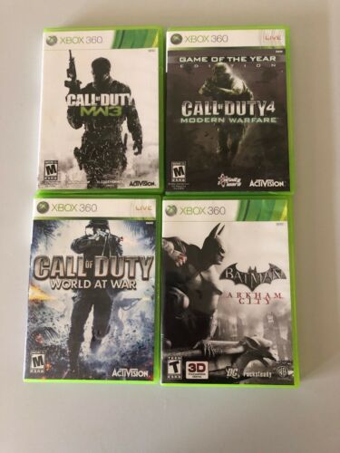 Lot of 4 Xbox 360 Games Call of Duty 4 Modern Warfare MW3 World At War Batman