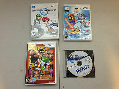 4pc. Lot Nintendo Wii Mariokart, Punch Out, Wii Sports Resort, etc.. Games
