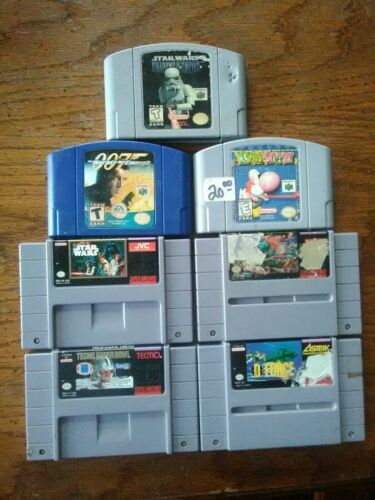 lot of 7 snes and n64 games. tested and working...