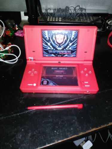 Nintendo Red DSI with 1 game,charger, and stylus