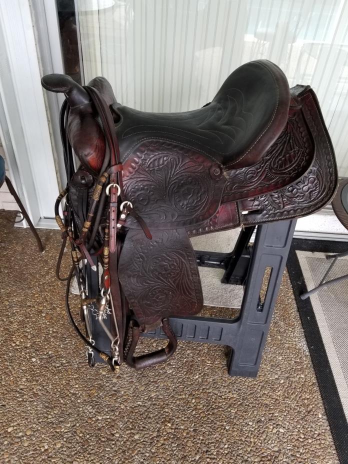 15 inch western saddle and rawhide wrapped bridle with long shank snaffle