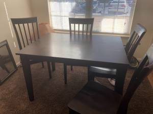 Antique Dark brown table set with 4 chairs (East Memphis)