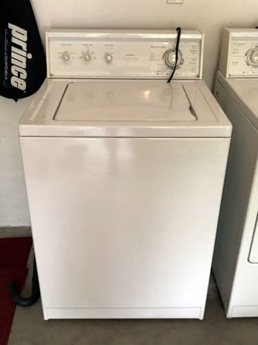 White Kenmore Washer and Electric Dryer Load in Front