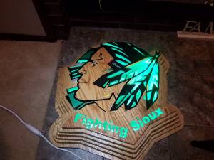 Fighting Sioux Indian heads (Oak wood)