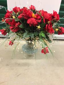 Red flower arrangement with footed glass vase (McLean)