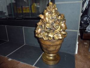 Large vintage bronze rose bouquet in vase, interior decorative element