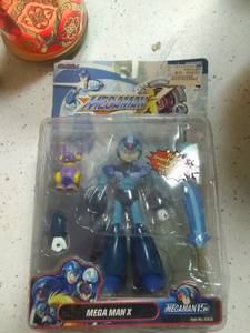 Megaman toy for .999 silver coin or games (5109 Foggia Ave)