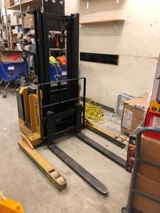 Big Joe walk behind pallet stacker (1709 Main St Lisbon, ND)