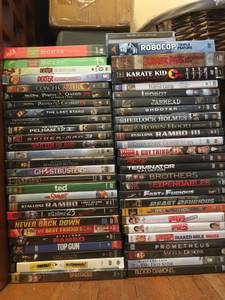Lot of DVDs and two CDs