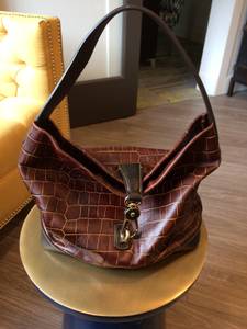 Dooney and Bourke leather hobo bag with logo lock and accessories (Bellevue)