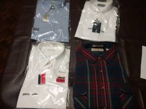 4 brand new shirts... still in the original bags (Kingsville)