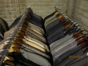 Many high-quality men's suits and sport coats mostly size 40L (AMES)