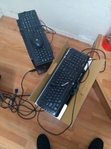 2 keyboards, 1 mouse, 1 hp tower, and a picture printer.