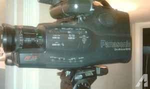Panasonic VHS Camcorder, metal office back desk, crt moniters ,