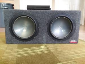 2 subwoofers and amp for sale (Kearney)