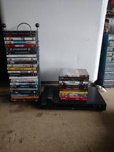 25 DVDs (couple are NEW) and DVD player (Gluckstadt/madison)