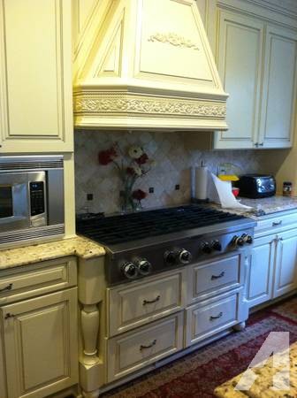 SS gas cooktop,custom cabinets and range hood cabinet -