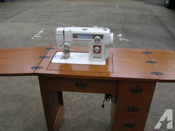 REDUCED--Vintage Janome, New Home Sewing machine with cabinet -