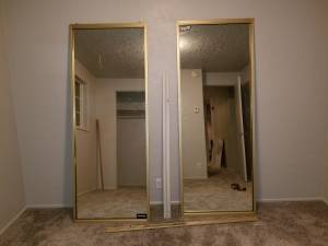 Gold sliding mirror closet doors