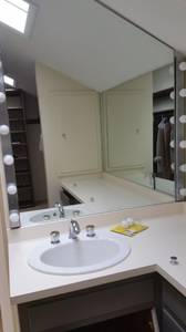 Vintage bathroom--vanity, white oval sink, 2 wall mirrors (Zionsville)